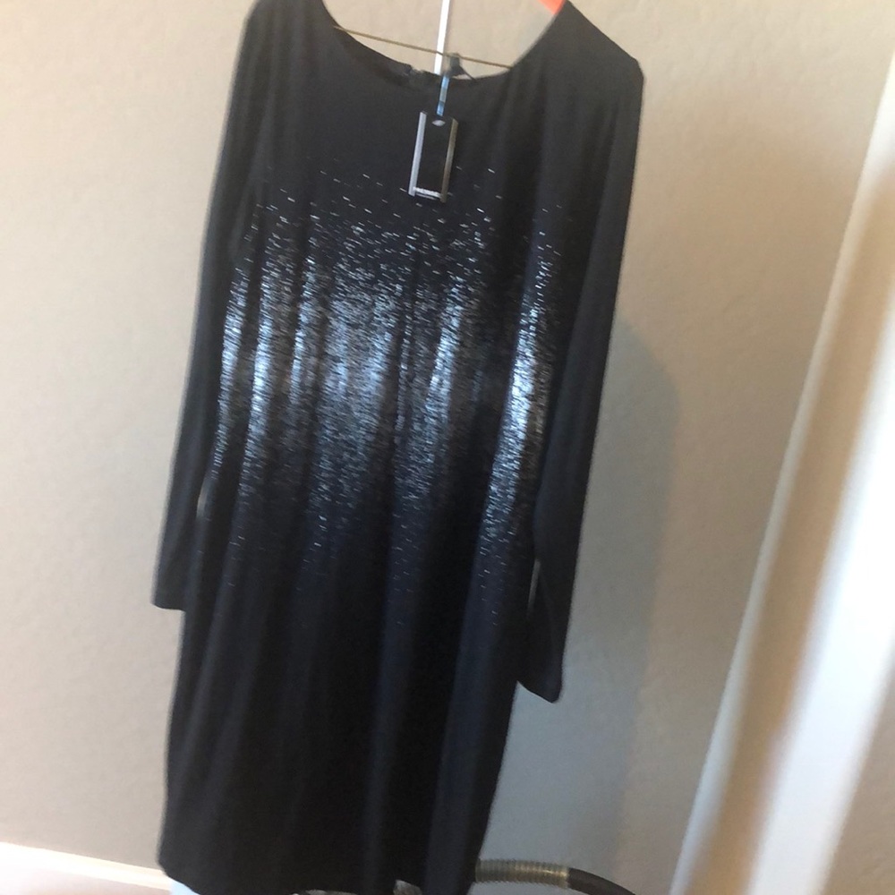 Rayon and spandex. Figure flattering.